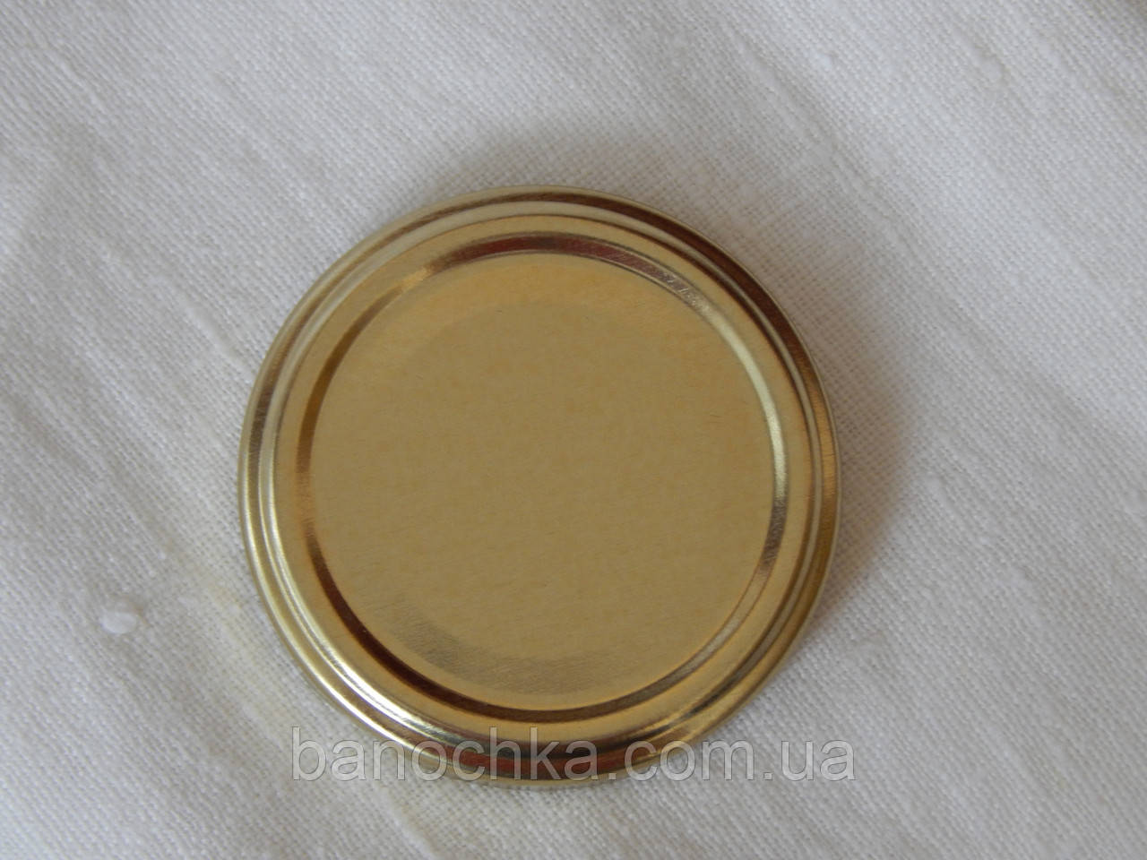 Кришка закаточна твіст-офф 63 мм золото