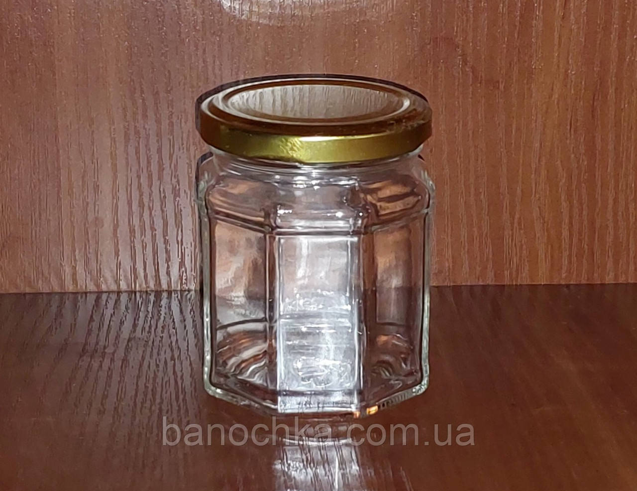 Банка скляна 229 мл восьмигранна із золотистою кришкою (24 штуки)
